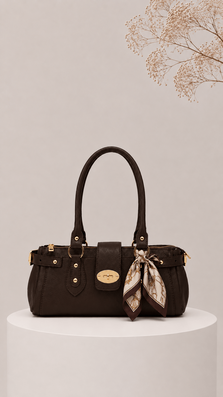 Bolso Noa en piel color marrón chocolate con herrajes dorados